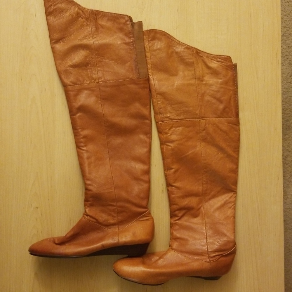 Thigh high brown boots